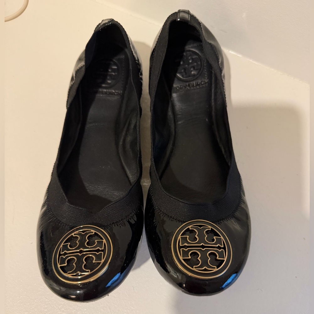 Tory Burch Glossy Black Flats with Gold Emblem